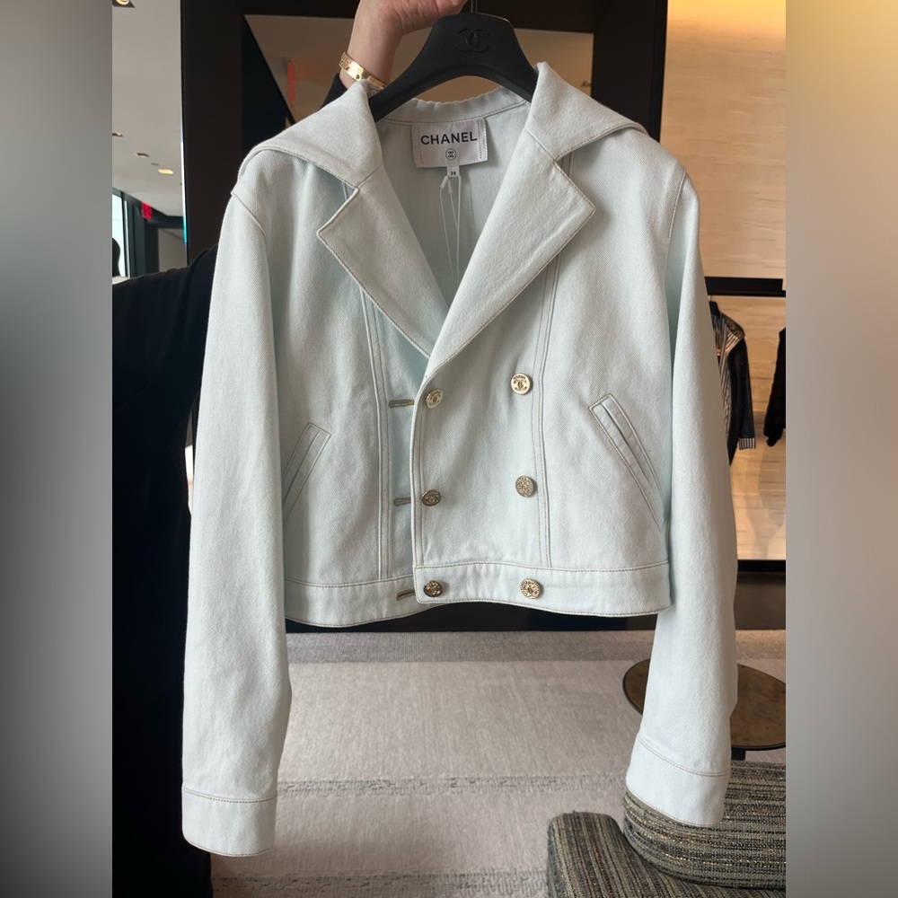 Chanel Coco Beach light blue Denim Jacket w.  CC button details.